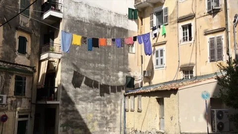 Line-Dried Colored Laundry Waving on The Rope. Video stock 70687216
