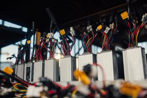 Line of e-bike controllers at the shelf, electronics warehouse Stock Photos