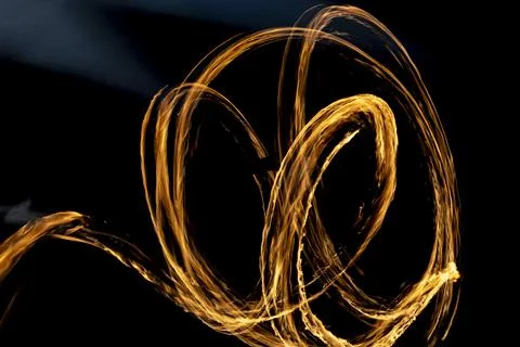 Line of fire in dark. Flame texture. Stock Photos