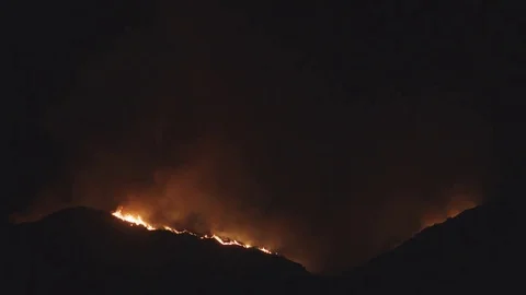 Line of flame on ridgeline Stock Footage 79606529