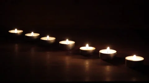Line of flickering tea candles Stock Footage 42794523