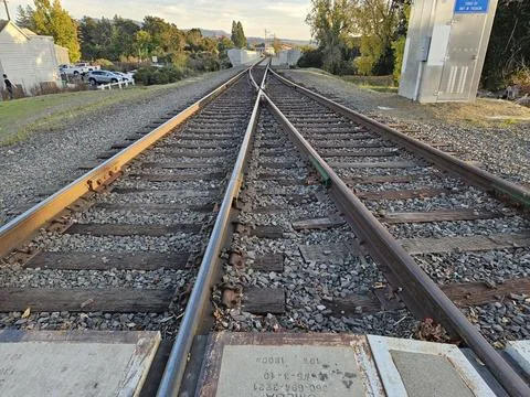 Line formation by train tracks in an intersection 스톡 사진