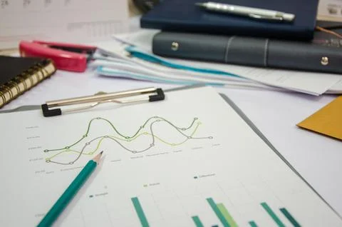 Line graph and a pencil Stock Photos