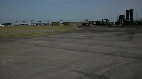Line of helicopters in flight over base Stock Footage 39750931