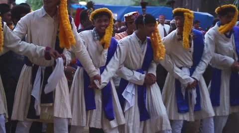Line of Hindu men dance in line during a festival, slow motion Stock Footage 66524940