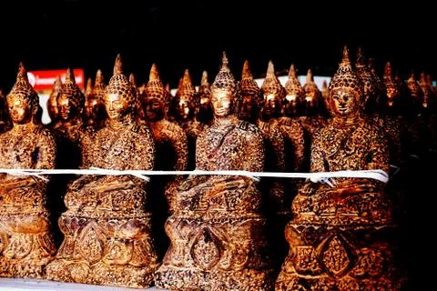 Line up of image of Buddha statues Foto stock