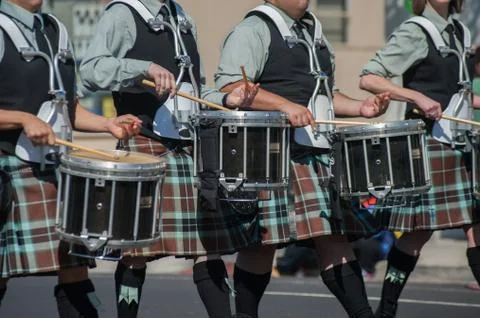 Line of kilted drummers Stock Photos