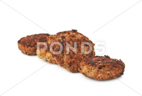 Line made of small cutlets isolated over white background Stock Photos