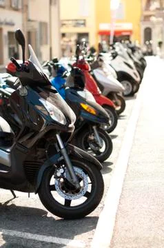 A line of mopeds/scooters Stock Photos