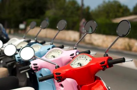 A line of mopeds/scooters Stock Photos