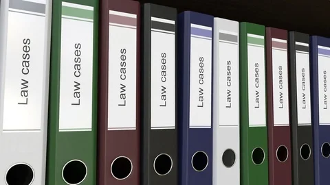 Line of multicolor office binders with Law cases tags. 4K seamless loop clip Video stock 73765606