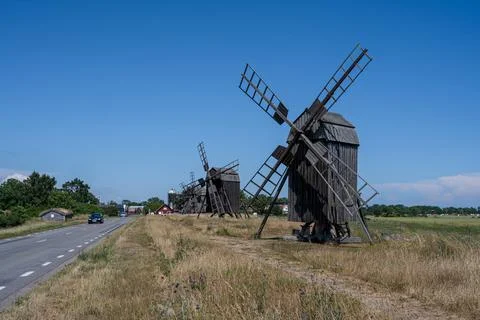 A line of old windmills on a plain Stock Photos