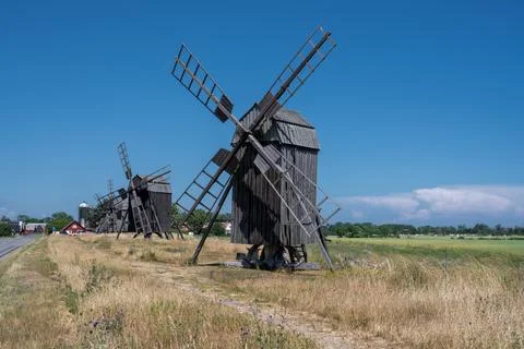 A line of old windmills on a plain Stock Photos