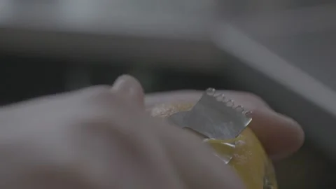 Line peeler on orange 스톡 동영상 163442491