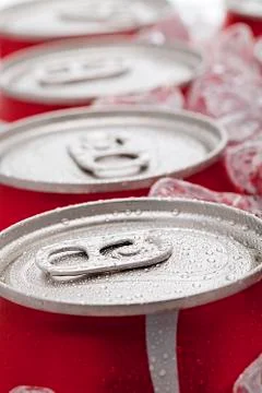 Line of pop cans Stock Photos