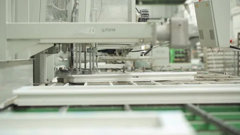 Line production of plastic windows. Plastic window frames move along the product Video stock 199486798