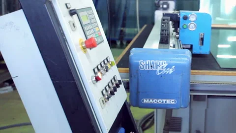 Line production of plastic windows. Worker in workshop. worker clicks on the Stock Footage 88366041