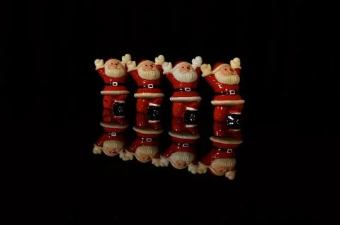 A line of Santas Foto stock