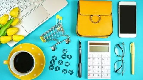 On-line shopping concept flatlay stop motion with shopping cart and accessori Stock Footage 113426302