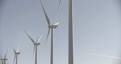 Line of Static Wind Mills Tilt Up Stock Footage 89942324