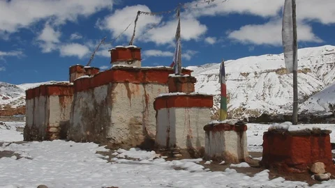 Line of stone blocks with Prayer flags on each of them in Nepal Mustang 動画素材 105608228