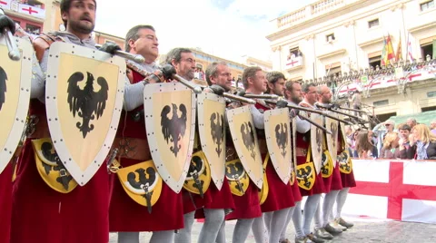 Line of warriors with shields standing and dancing Stock Footage 47968041