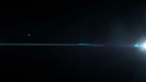Linear Anamorphic Lens Flare on Black Background Shooted in Slow Motion. Stock Footage 344105571