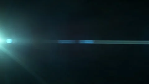 Linear Anamorphic Lens Flare on Black Background Shooted in Slow Motion. Stock Footage 346309780