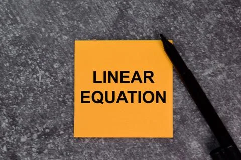 Linear Equation on top view isolated on office desk. Stock Photos