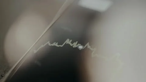 Linear graph with a highlighted point, view through eyeglasses Video stock 330251942