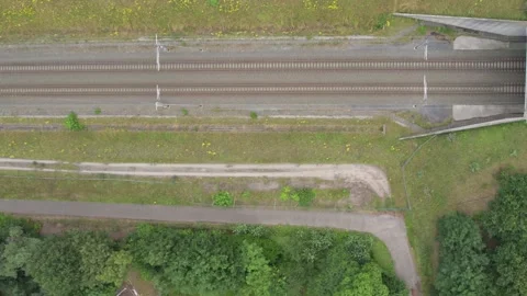 Linear Perspectives: Bird's-Eye View of Railroad Tracks Stock Footage 257966035