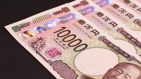 Lined up 10,000 yen bills close up, rotating Video stock 311292056