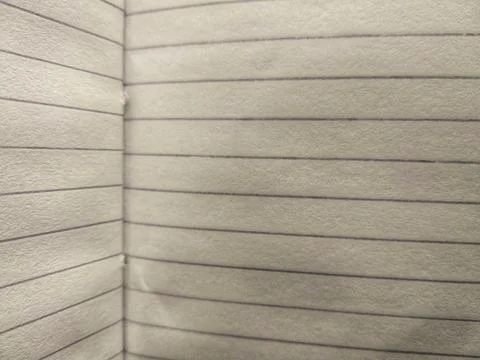 Lined notebook paper texture background close-up Stock Photos