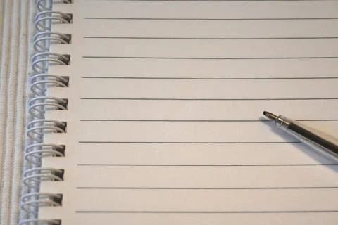 Lined notebook with pen for back to school Fotos de archivo