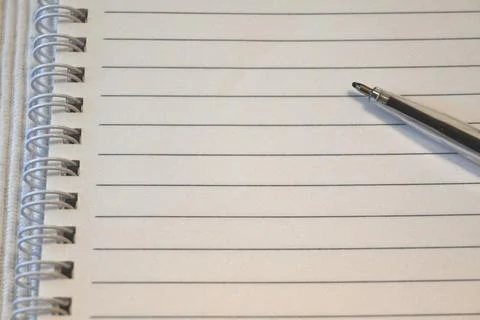 Lined notebook with pen Photos