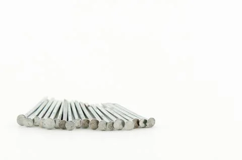 Lined up shiny white nails Stock Photos