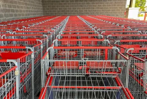 Lined up shopping carts Stock Photos