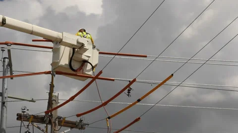 Lineman connecting wires Stock Footage 39270641