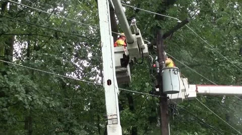 Lineman pull cable during repair. Stock Footage 8847719