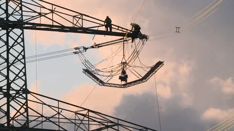 Linemen work on power lines Stock Footage 163083287
