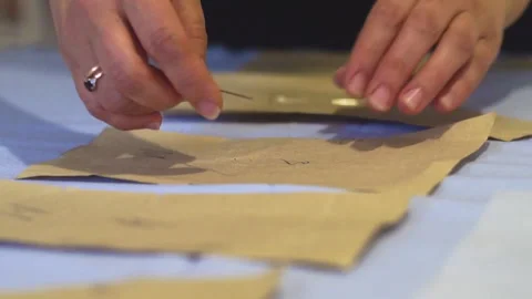 Linen fabric piercing Stock Footage 141384449