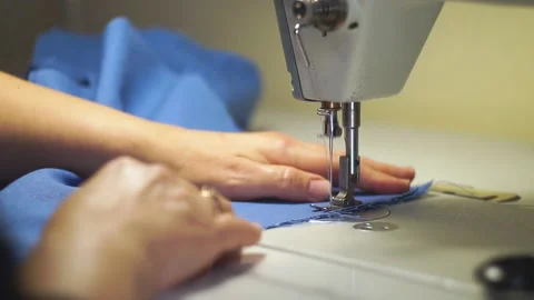 Linen fabric sewing process Stock Footage 141385067