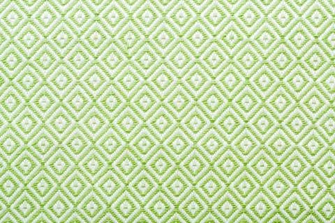 Linen napkin with a clear geometric pattern. Diamonds and squares. Stock Photos