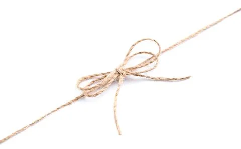 Linen rope string with bow isolated on white, top view Stock Photos