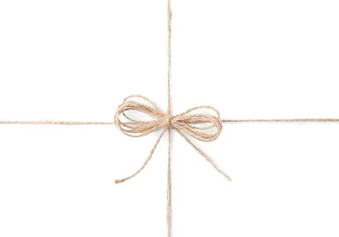 Linen rope string with bow isolated on white, top view Stock Photos