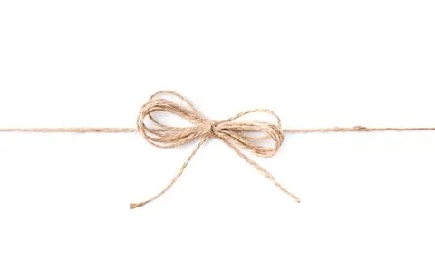 Linen rope string with bow isolated on white, top view Stock Photos