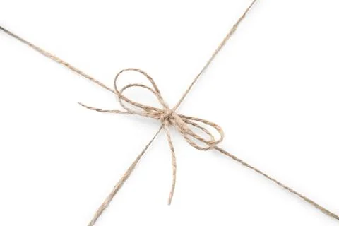 Linen rope string with bow isolated on white, top view Stock Photos