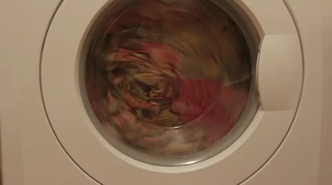 Linen is washed in a washing machine Stock Footage 12129531