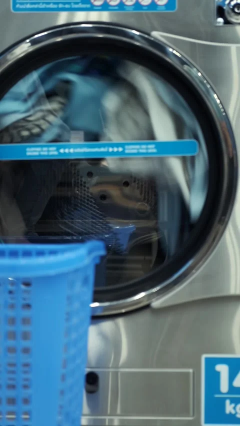 Linen is washed in a washing machine in the laundry room Stock Footage 270162745