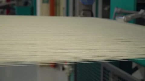 Linen yarn manufacturing process on textile factory machinery Stock Footage 247191031